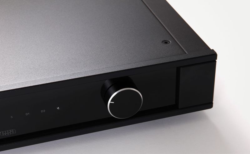Macro of the Elex MK4 fascia, the machined volume knob at the right and the brushed top plate meeting the front panel edge