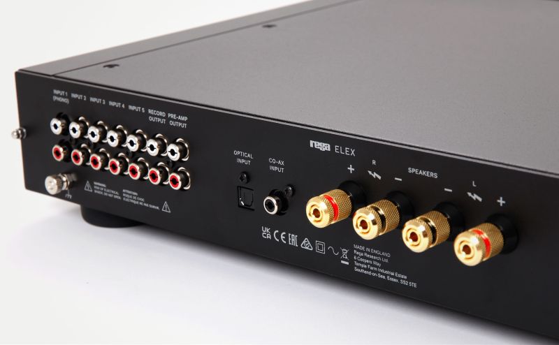 Close view of the Elex MK4 rear panel: the labelled RCA input rows, optical and co-axial digital inputs and four gold loudspeaker binding posts