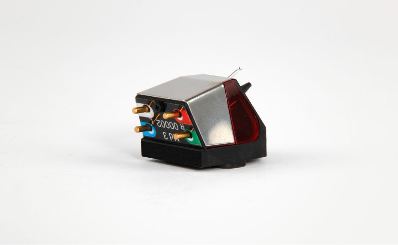 The Nd3 from behind, four gold output pins with colour-coded tag wires and the printed impedance label on the body