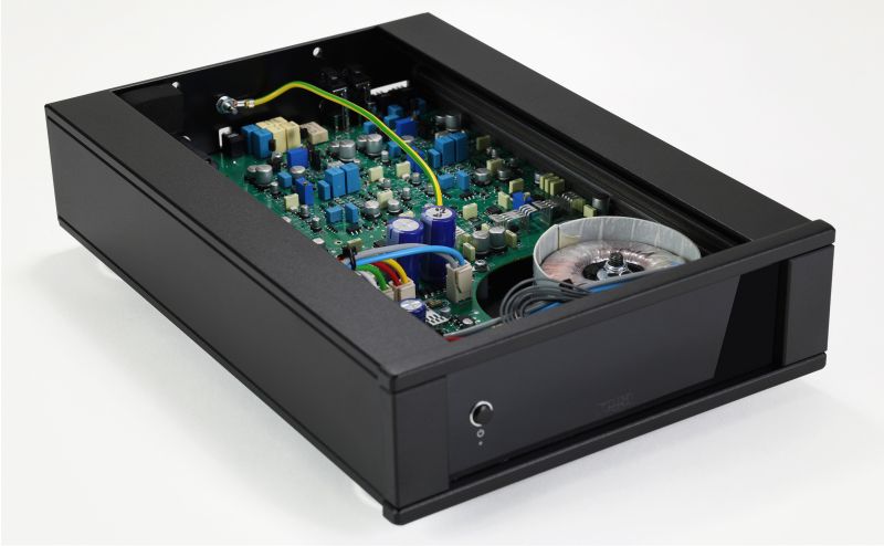 The Aos MC opened at an angle, the circuit board and toroidal transformer sitting inside the aluminium case