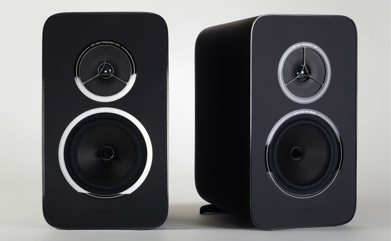 The pair of Kyte loudspeakers without grilles, the ZRR high frequency unit above the bass-mid driver, each ringed in labelled polished trim