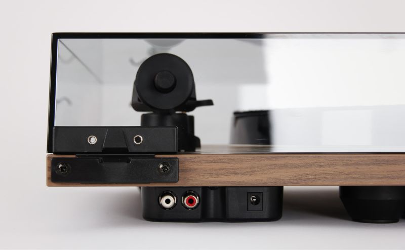 Rear of the Walnut effect Planar 1 Plus showing the phono stage output sockets